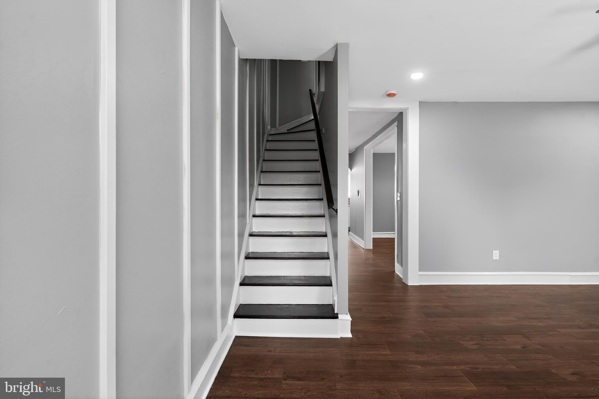 223 Noreg Place Brooklawn, NJ 08030 - Photo 22 of 36 a view of entryway with stairs and wooden floor