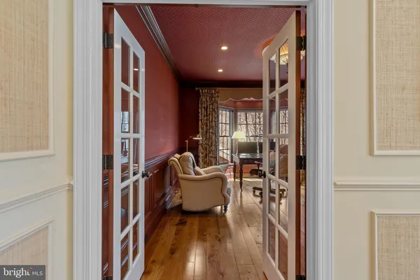 a bathroom with a bathtub and a window