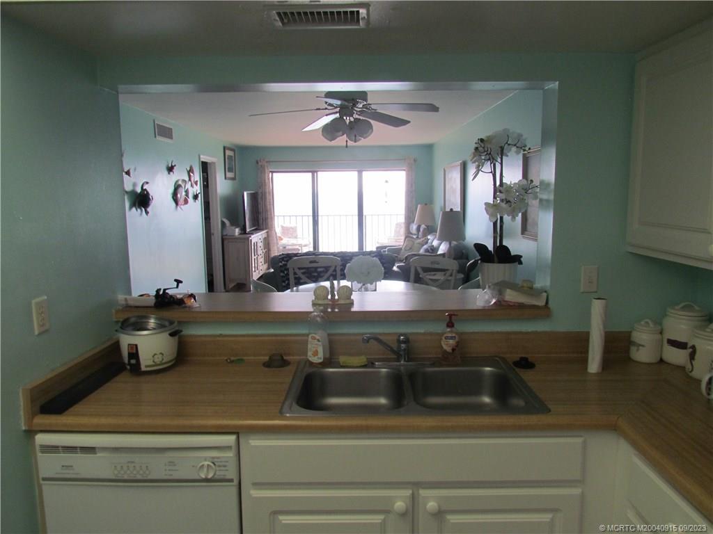 9400 South Ocean Drive, Unit 504B Jensen Beach, FL 34957 - Photo 13 of 42 a bathroom with a sink and mirror