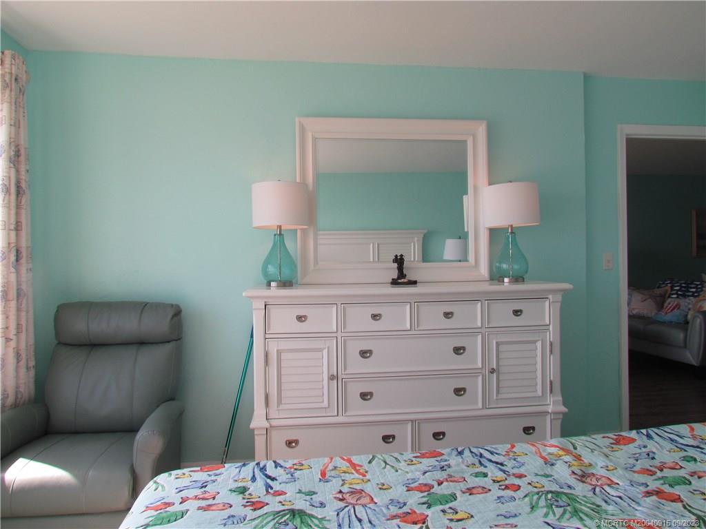 9400 South Ocean Drive, Unit 504B Jensen Beach, FL 34957 - Photo 21 of 42 a bathroom with a sink and a mirror