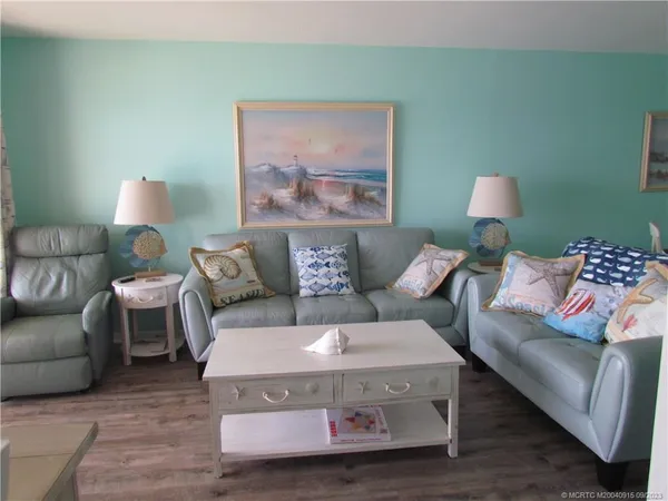 a living room with furniture and a couch