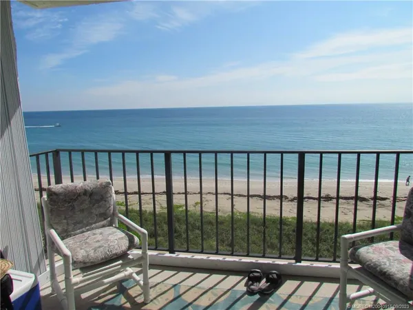 a balcony with furniture