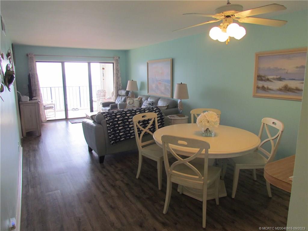 9400 South Ocean Drive, Unit 504B Jensen Beach, FL 34957 - Photo 4 of 42 a view of a dining room with furniture window and wooden floor