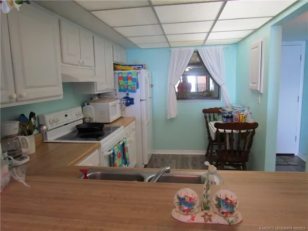 a room with furniture and wooden floor