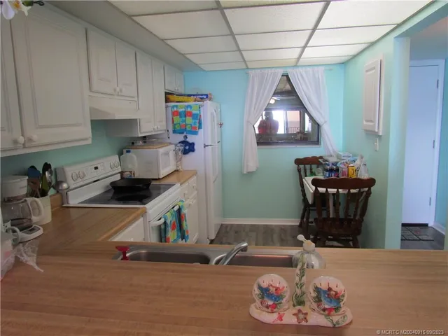 a room with furniture and wooden floor