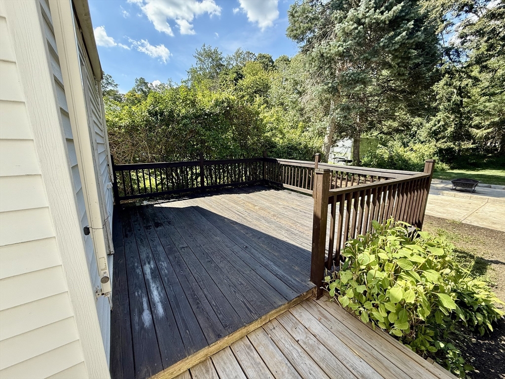 570 Sutton Street Northbridge, MA 01534 - Photo 16 of 20 a view of balcony with wooden floor