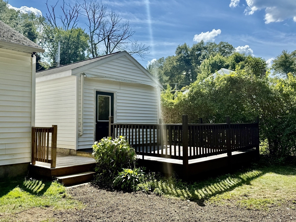 570 Sutton Street Northbridge, MA 01534 - Photo 19 of 20 a view of a deck with a bench