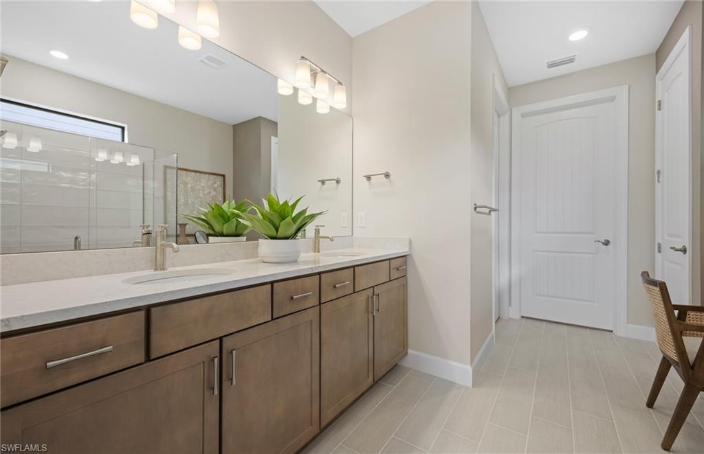 18420 Ridgeline Drive Estero, FL 33928 - Photo 37 of 48 Dual sinks - Photos are from a model home and are for illustration purposes only.