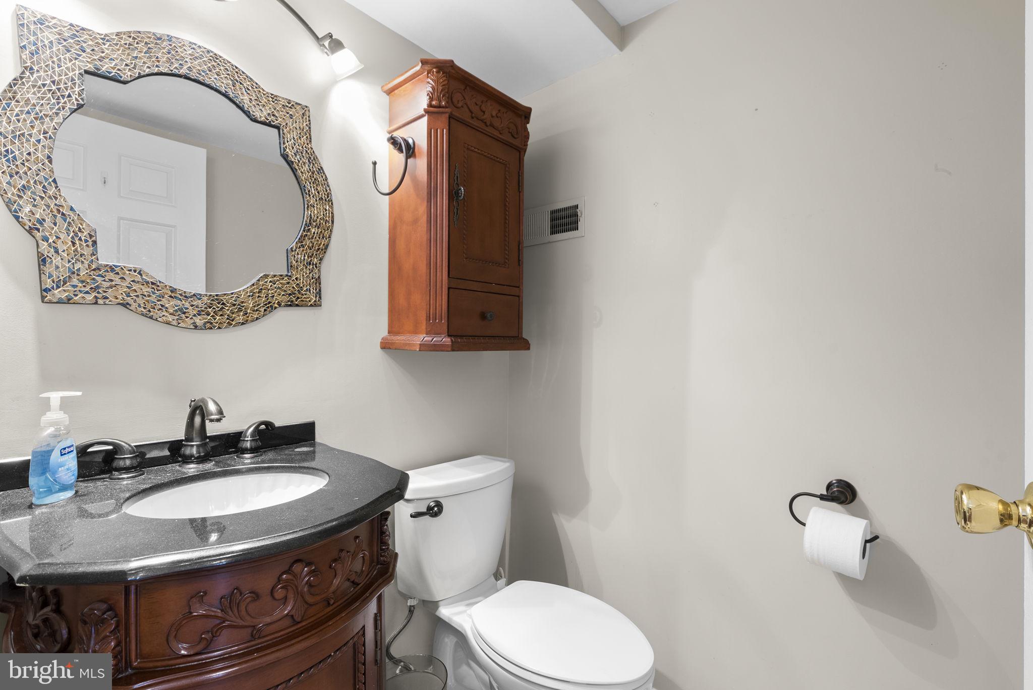 8004 Broken Reed Court Frederick, MD 21701 - Photo 18 of 49 Half Bathroom - Main Level