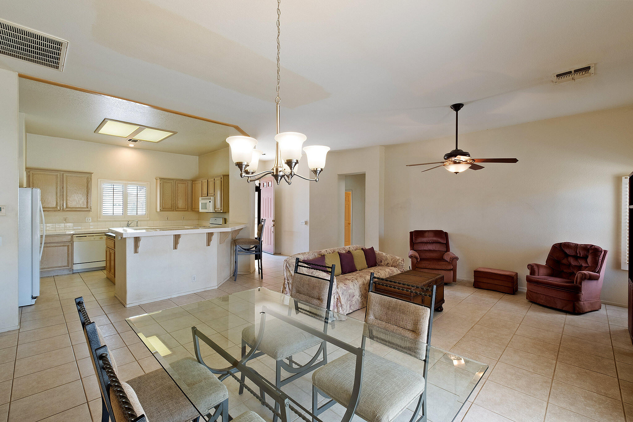68338 Riviera Road Cathedral City, CA 92234 - Photo 13 of 29 a view of a dining room with furniture