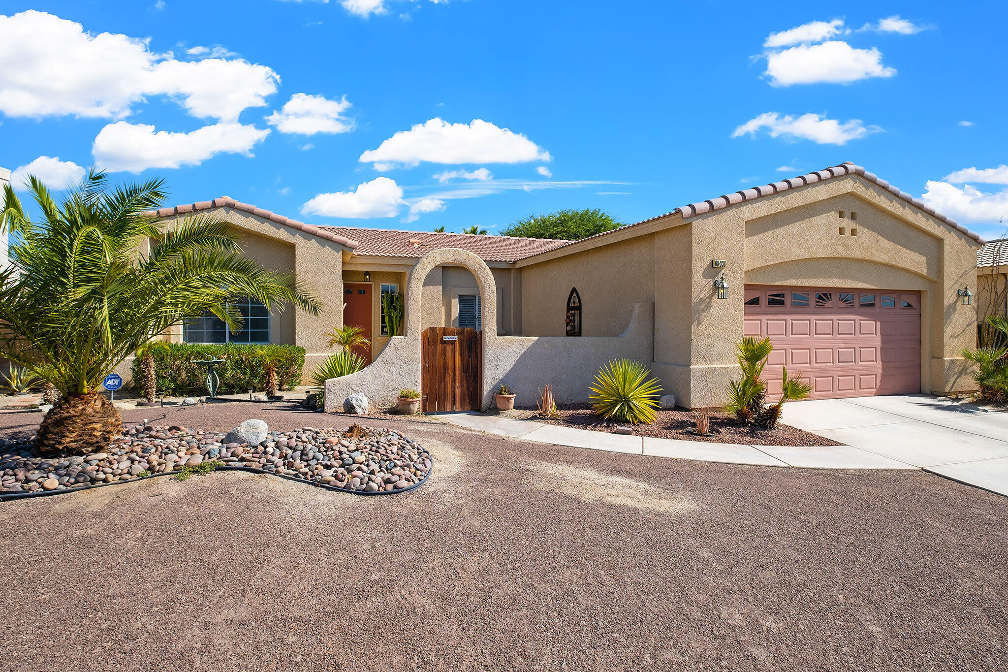 68338 Riviera Road Cathedral City, CA 92234 - Photo 2 of 29 a view of a house with porch and sitting area