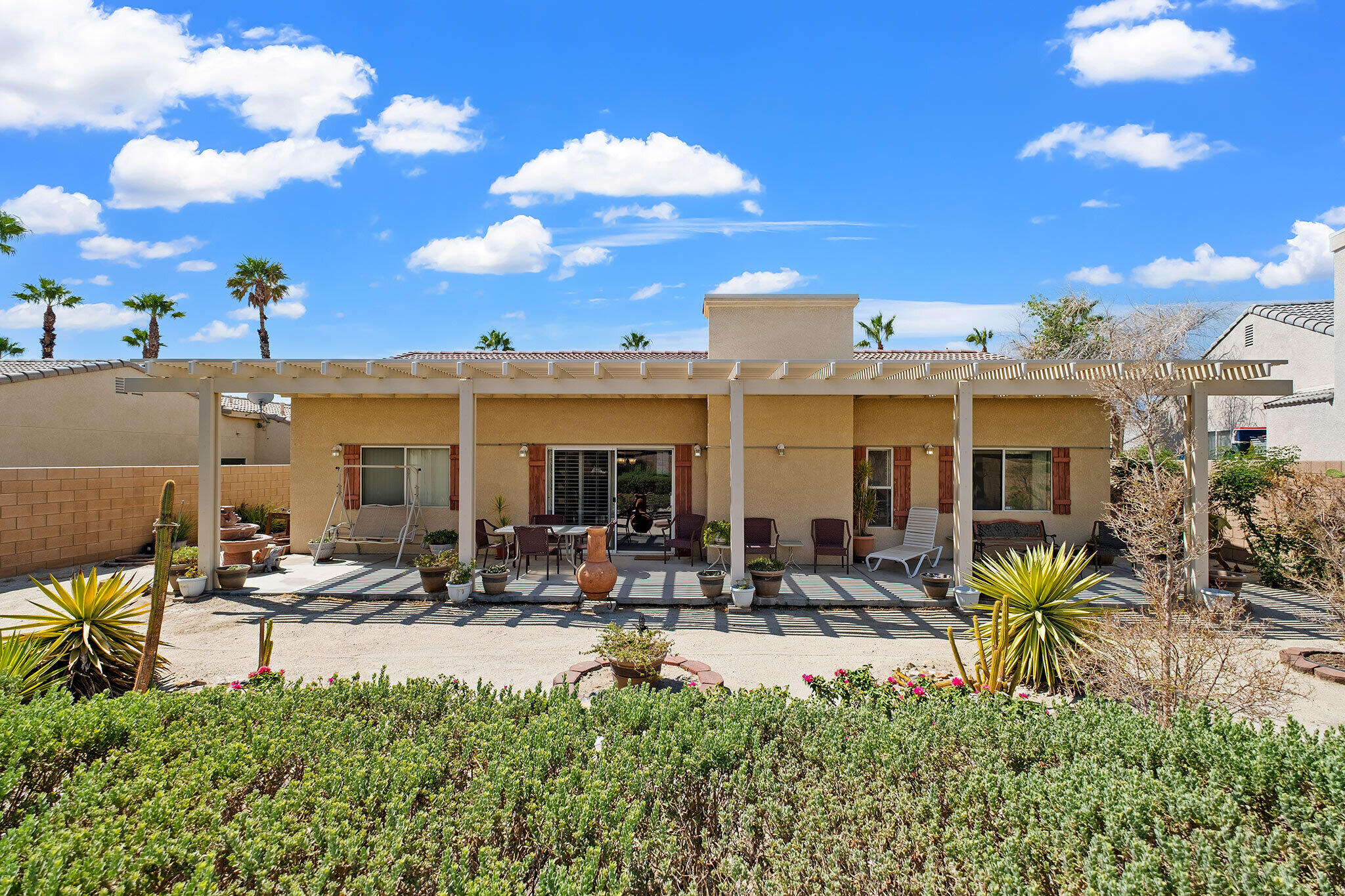 68338 Riviera Road Cathedral City, CA 92234 - Photo 7 of 29 a view of a swimming pool with outdoor seating