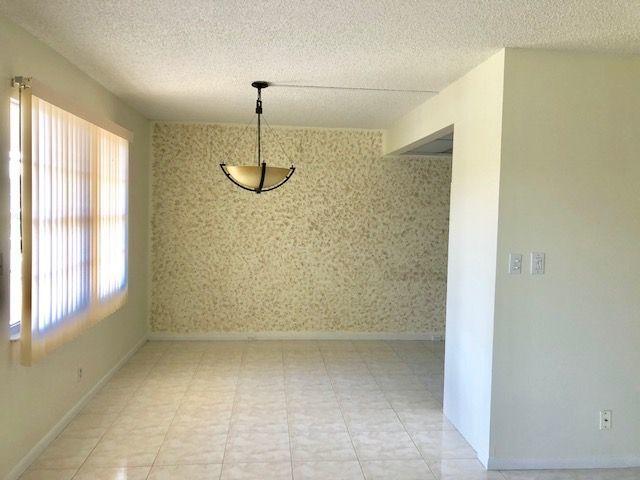 2022 Wolverton East, Unit 2022 Boca Raton, FL 33434 - Photo 3 of 21 a bathroom with a shower