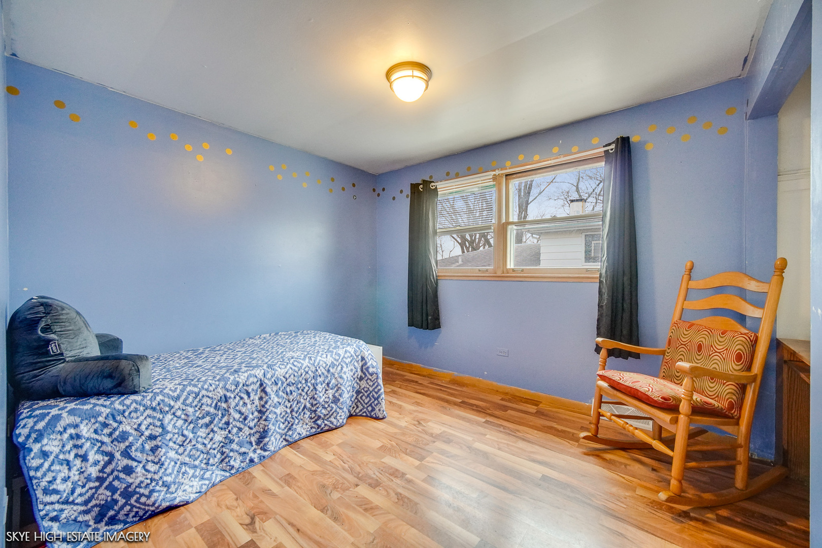 14850 Homan Avenue Midlothian, IL 60445 - Photo 6 of 13 a bedroom with a bed and wooden floor