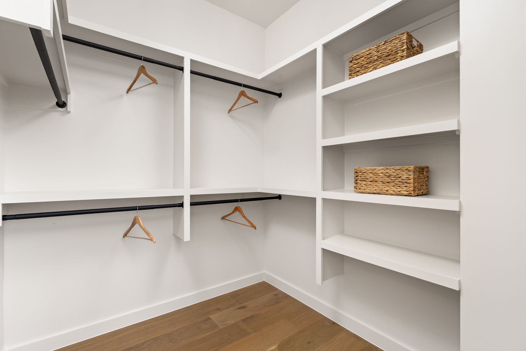 2717 Lyons Road, Unit 1 Austin, TX 78702 - Photo 22 of 40 Ample shelving and hanging space defines this well-organized walk-in closet.