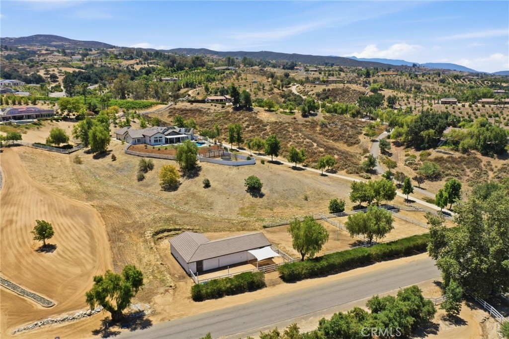 41110 Los Ranchos Circle Temecula, CA 92592 - Photo 73 of 77 an aerial view of residential houses with outdoor space