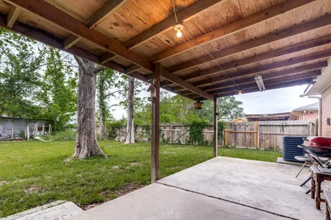a view of a porch with a backyard