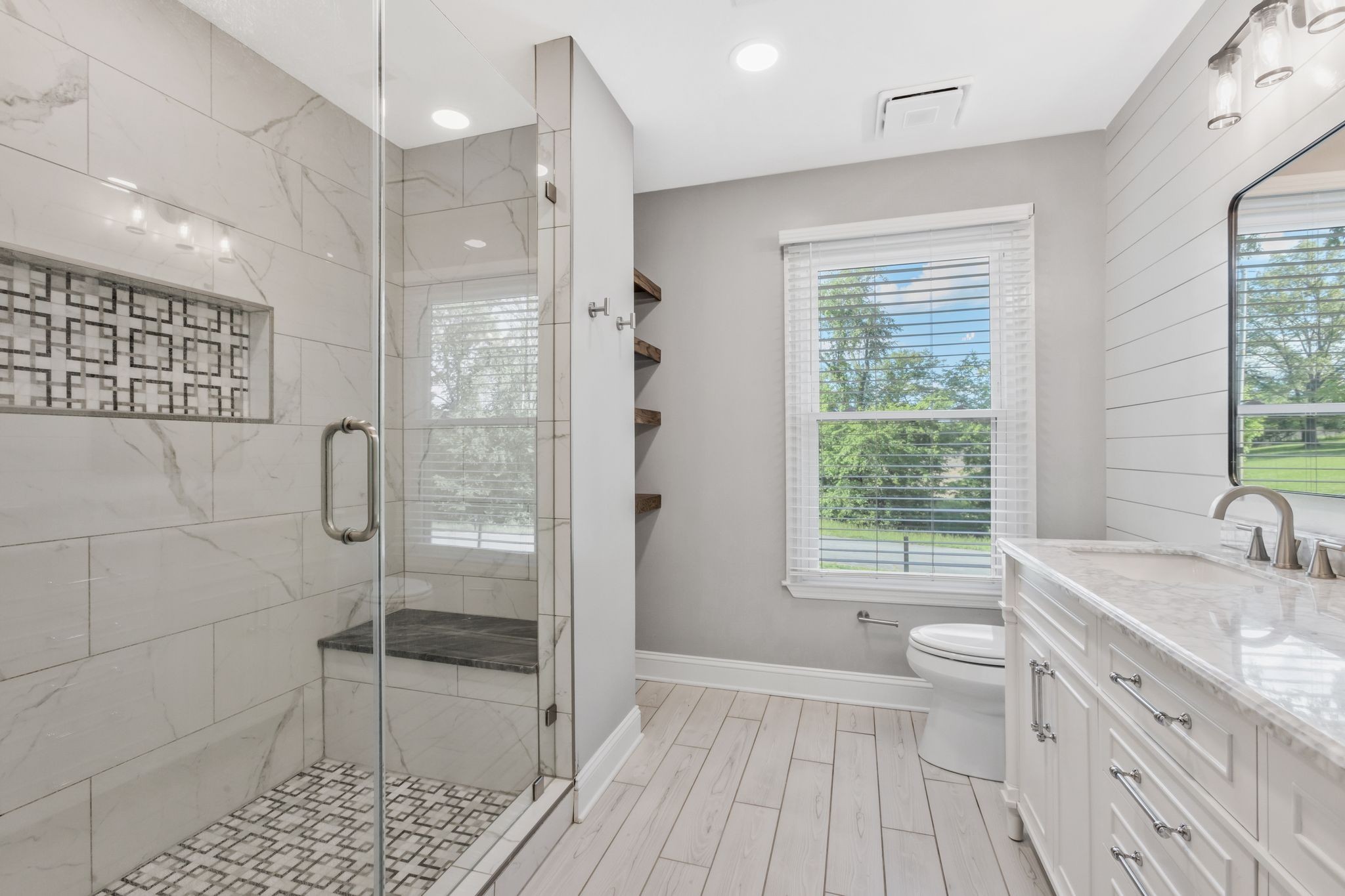 3508 Forest Park Road Springfield, TN 37172 - Photo 20 of 45 a bathroom with a granite countertop sink a toilet and shower