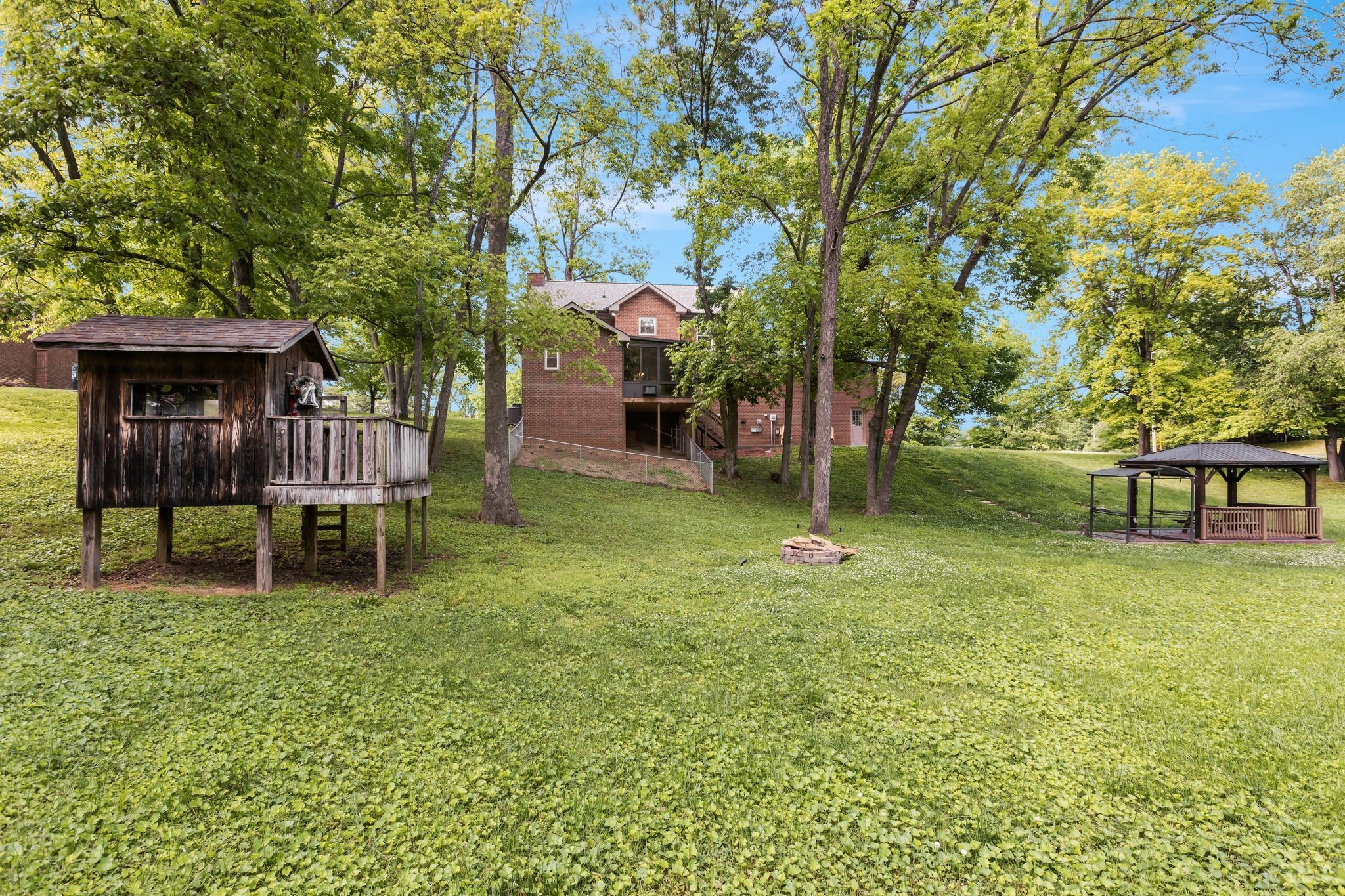 3508 Forest Park Road Springfield, TN 37172 - Photo 39 of 45 a wooden bench sitting in the middle of a yard