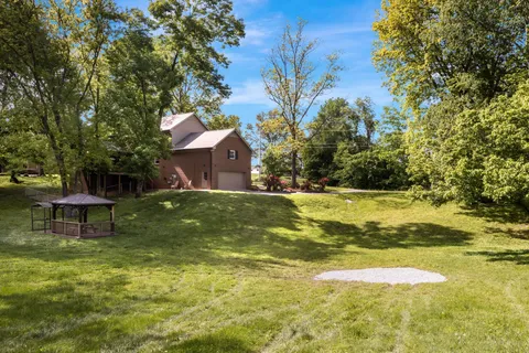 a view of a house with a swimming pool