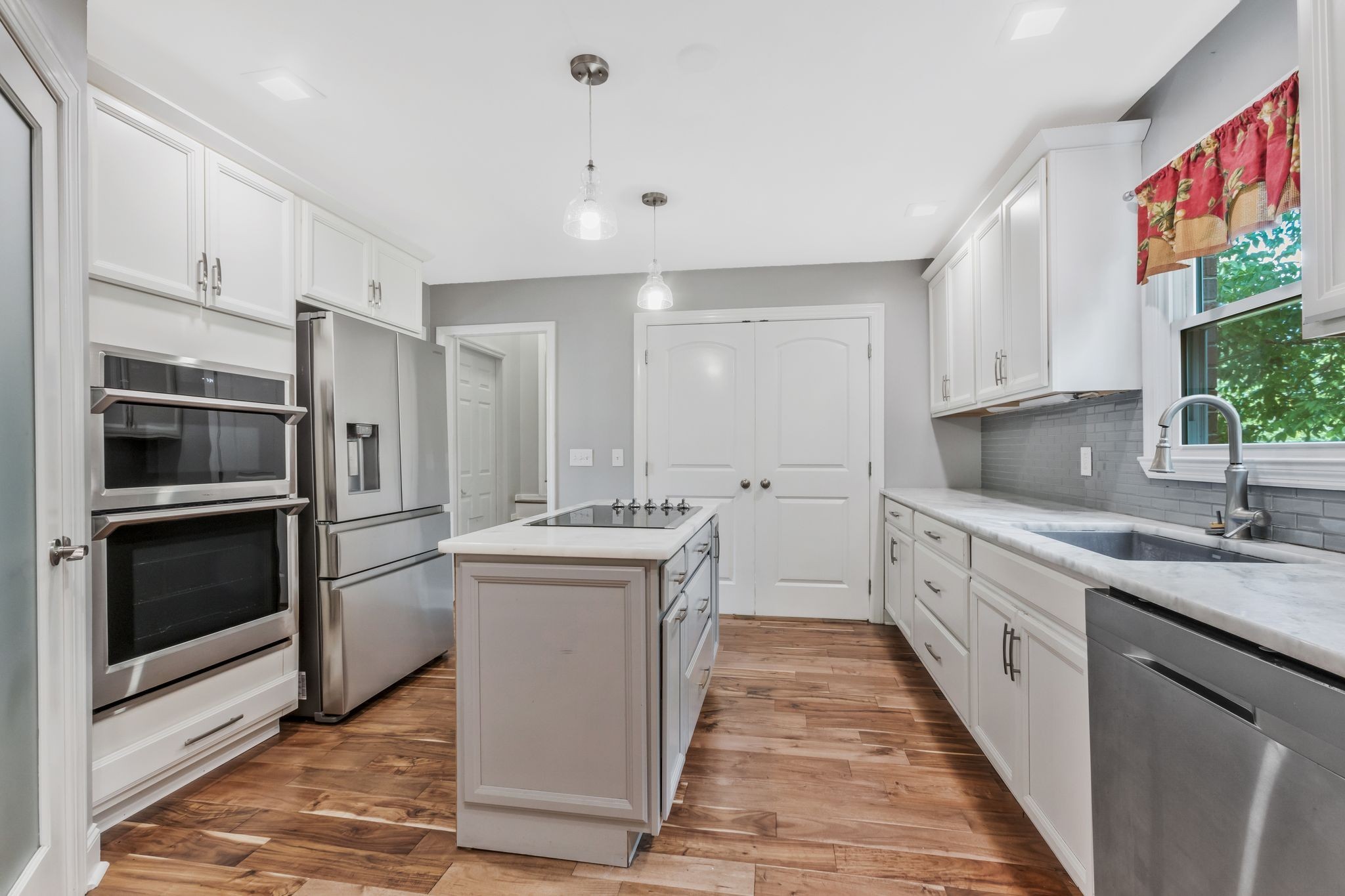 3508 Forest Park Road Springfield, TN 37172 - Photo 10 of 45 a kitchen with a sink stove and refrigerator
