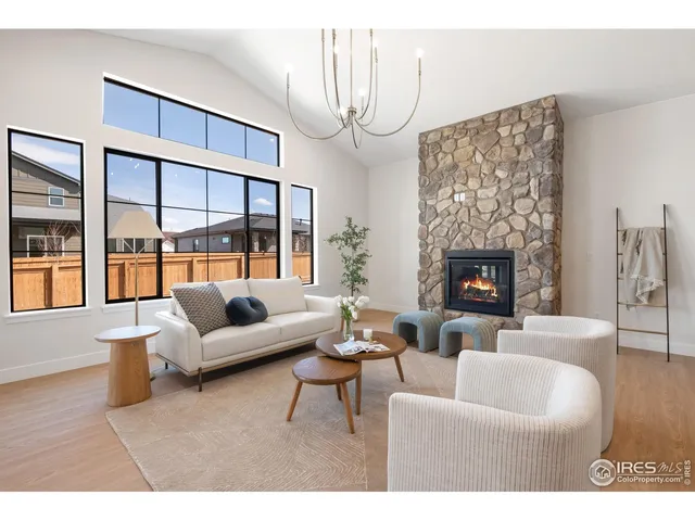 a kitchen with center island table and chairs
