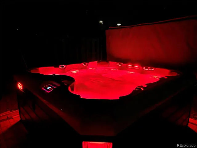 a small white house with a outdoor space