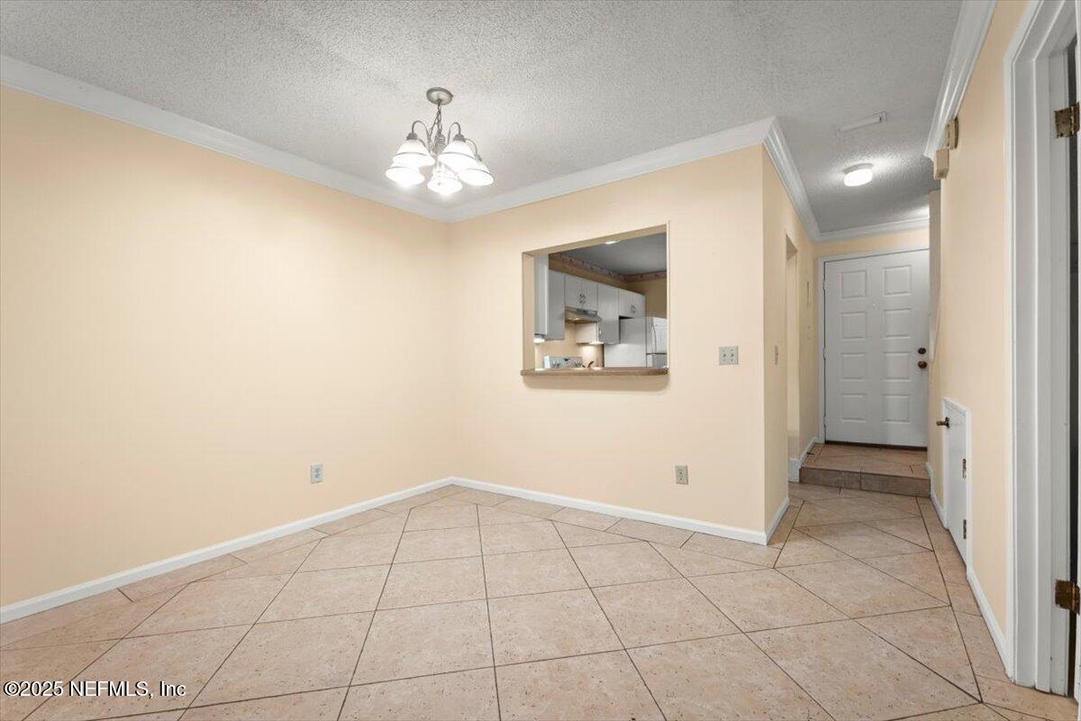 3801 Crown Point Road, Unit 3073 Jacksonville, FL 32257 - Photo 13 of 26 a view of an empty room with a bathroom