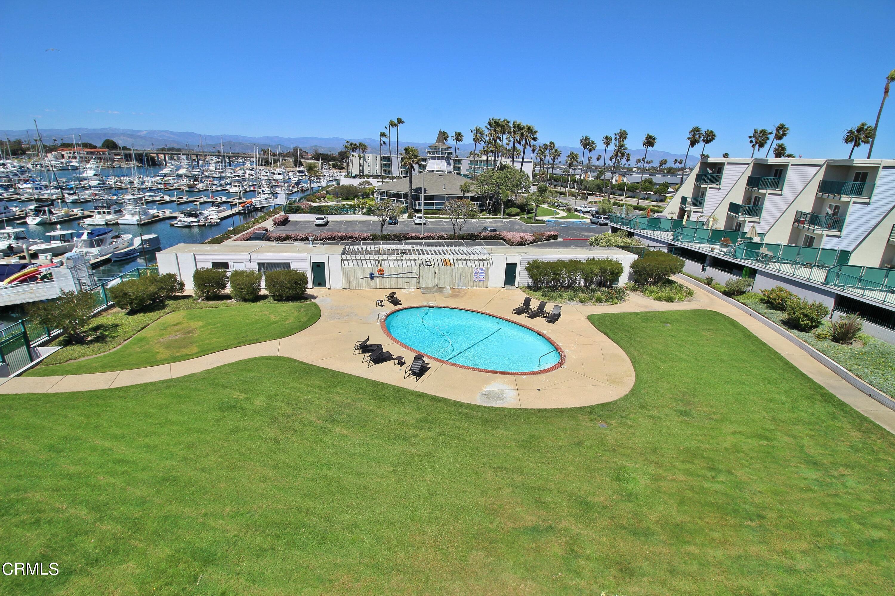 3101 Peninsula Road, Unit 312 Oxnard, CA 93035 - Photo 22 of 26 an aerial view of a residential houses with outdoor space and swimming pool