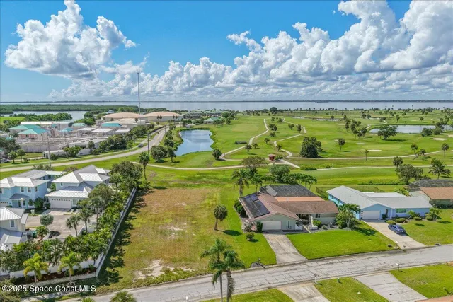 a view of swimming pool with a garden
