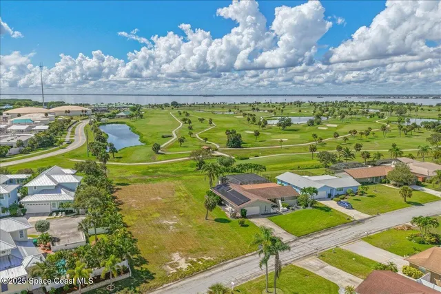 a view of swimming pool yard and lake view