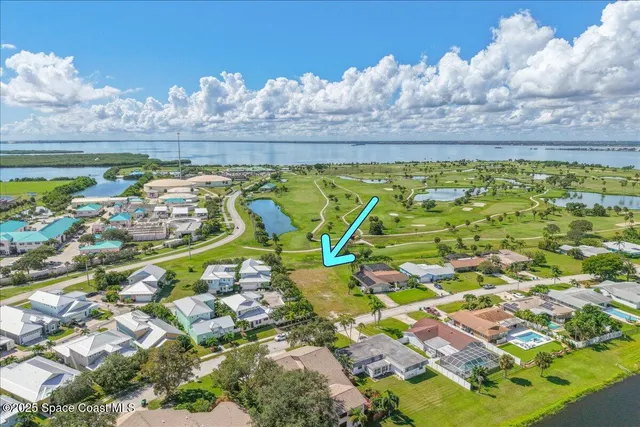 a view of swimming pool from a balcony