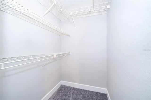 a view of small space with racks on the wall