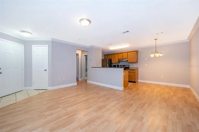 a view of a kitchen with a sink and a microwave