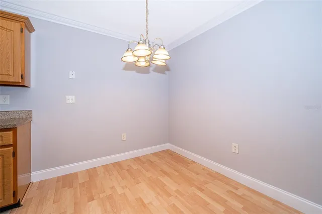 a view of a room with a dishwasher and a window