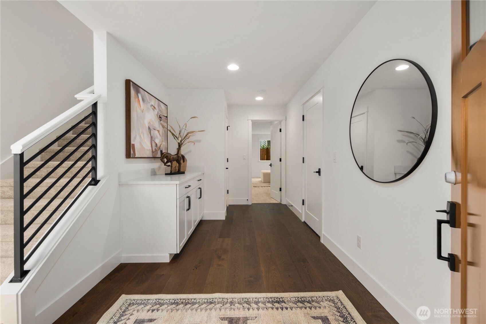 4119 220th Place Southeast Bothell, WA 98021 - Photo 28 of 31 a view of a hallway with washer and dryer