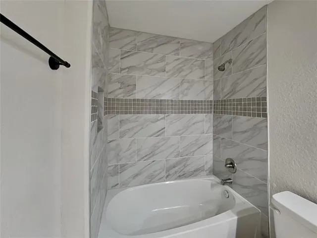 a bathroom with a bathtub