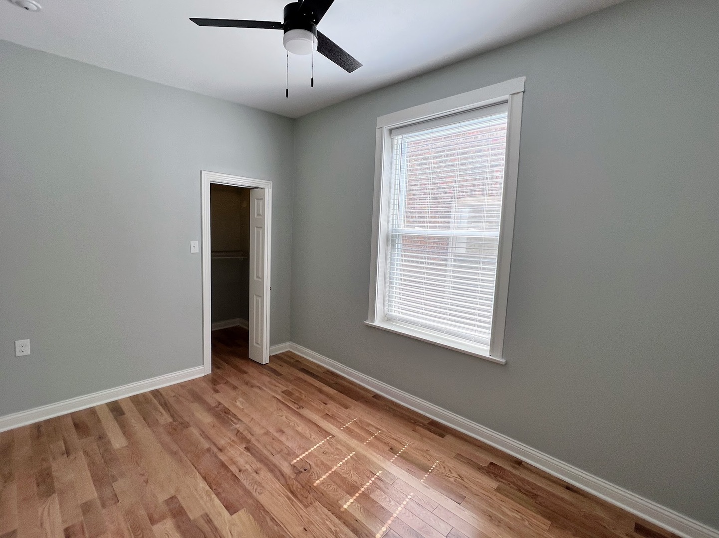4244 North Spaulding Avenue, Unit 3 Chicago, IL 60618 - Photo 10 of 16 a view of an empty room with a window