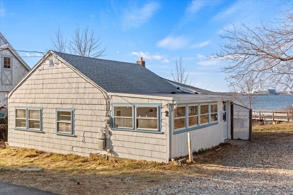 2 Nonantum Road Marblehead, MA 01945 - Photo 1 of 19 a front view of a house with a yard