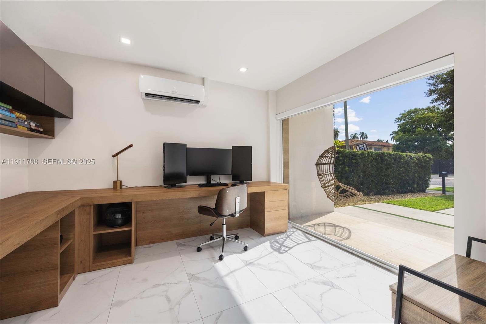 47 Southwest 21st Road Miami, FL 33129 - Photo 12 of 28 a view of a workspace with furniture