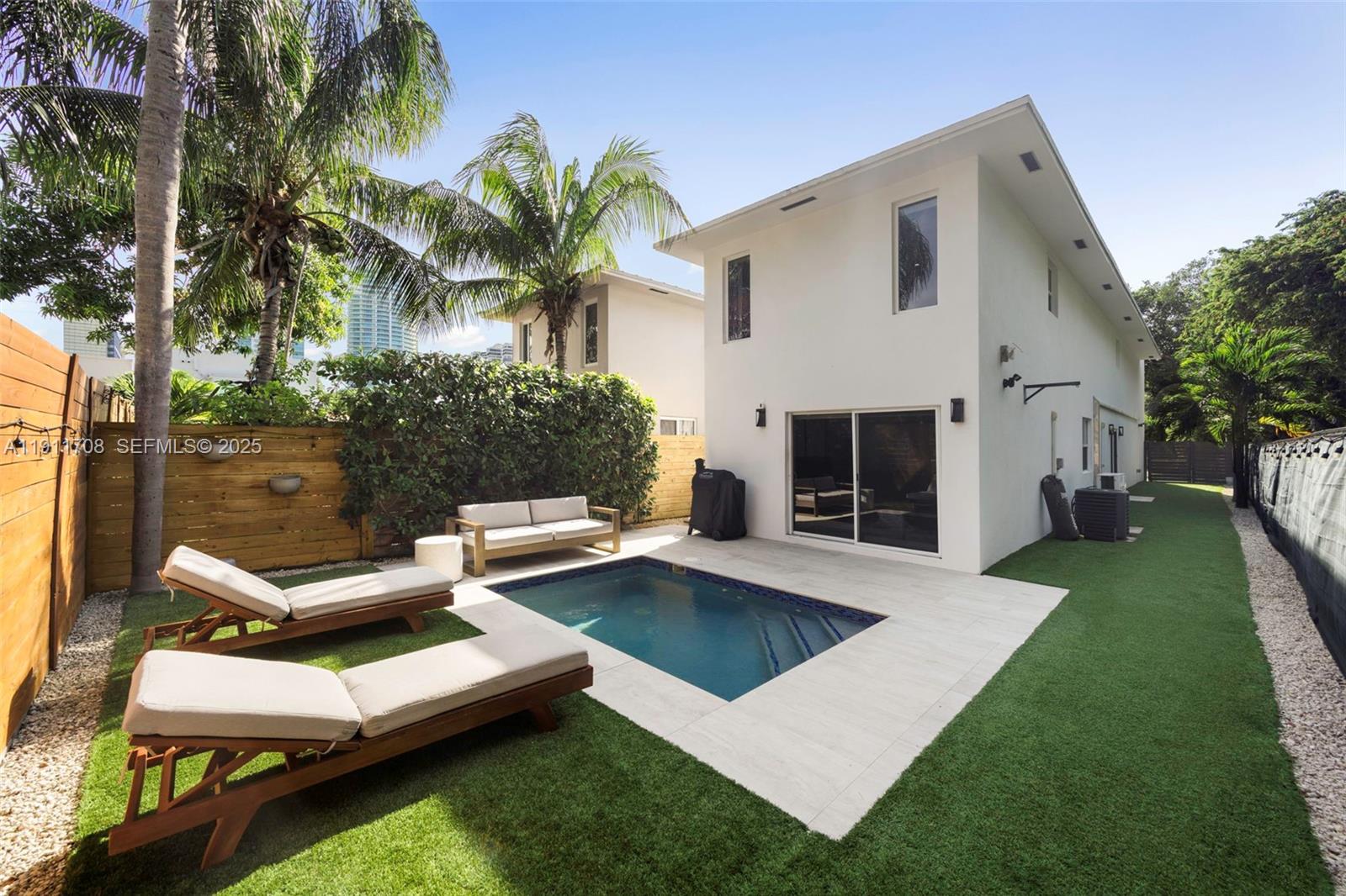 47 Southwest 21st Road Miami, FL 33129 - Photo 24 of 28 a view of a house with patio