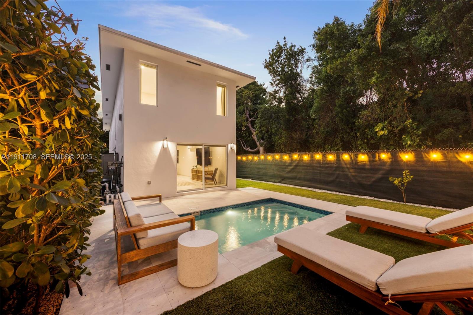 47 Southwest 21st Road Miami, FL 33129 - Photo 26 of 28 a view of a patio with chairs and a potted plant