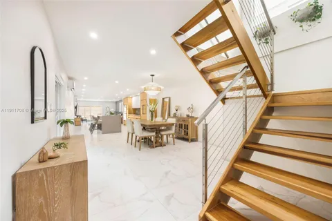 a view of dining room with furniture and rug
