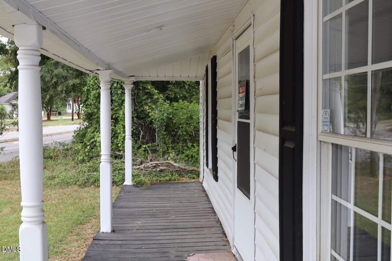 240 East Raleigh Boulevard Rocky Mount, NC 27801 - Photo 5 of 23 a view of a balcony with wooden floor and wooden floor