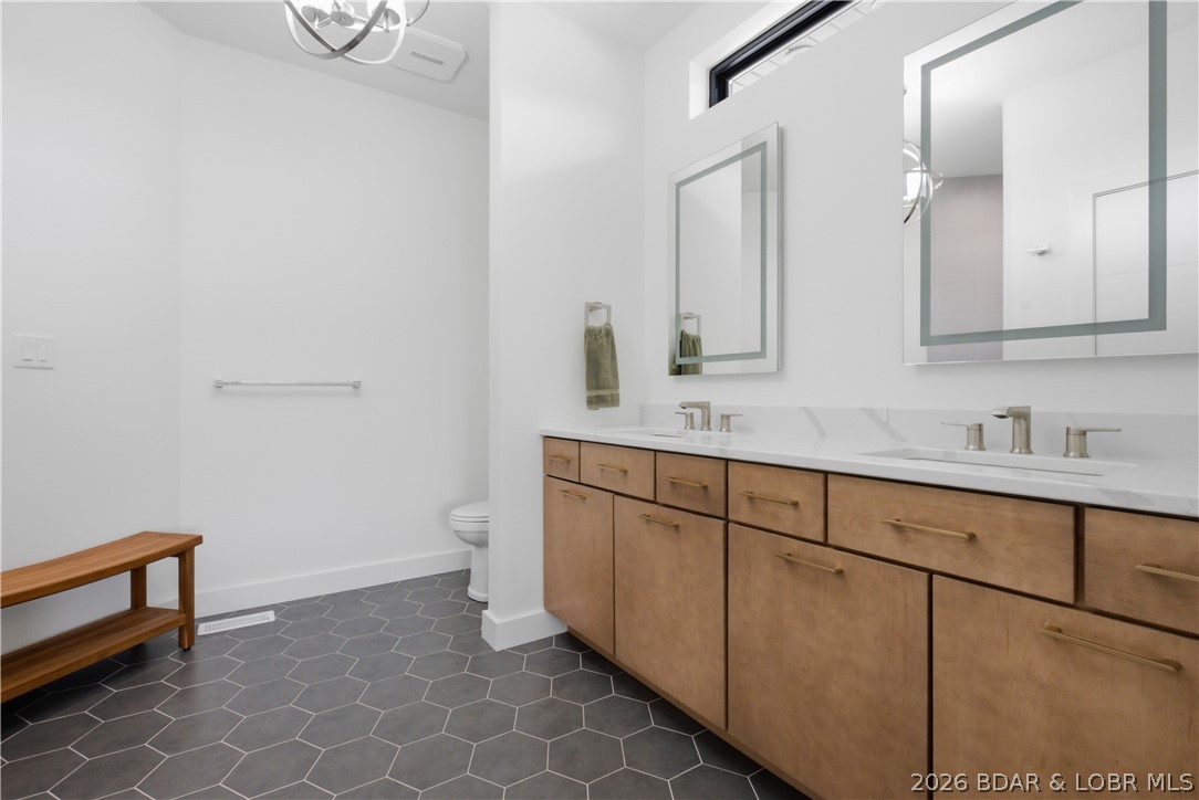 1175 Oak Road Osage Beach, MO 65065 - Photo 23 of 38 Luxurious spa-like primary bathroom with modern fi