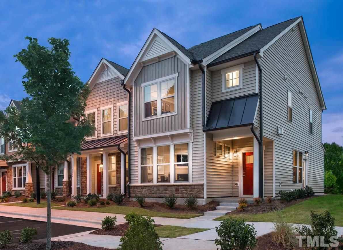 1116 Midtowne Way Durham, NC 27713 - Photo 12 of 25 a front view of a house with a yard