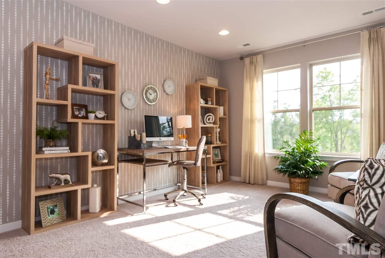 1116 Midtowne Way Durham, NC 27713 - Photo 13 of 25 a view of a livingroom with workspace and a window