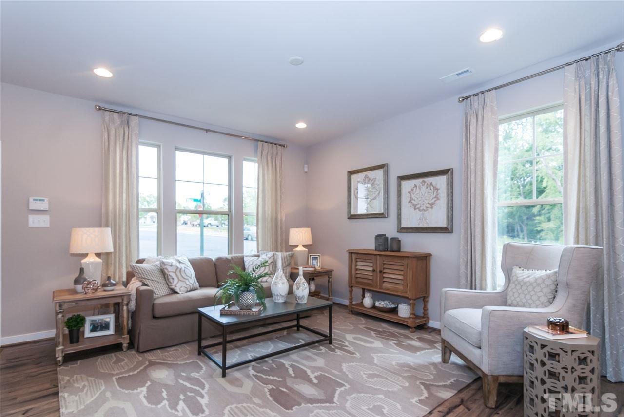 1116 Midtowne Way Durham, NC 27713 - Photo 20 of 25 a living room with furniture and a large window