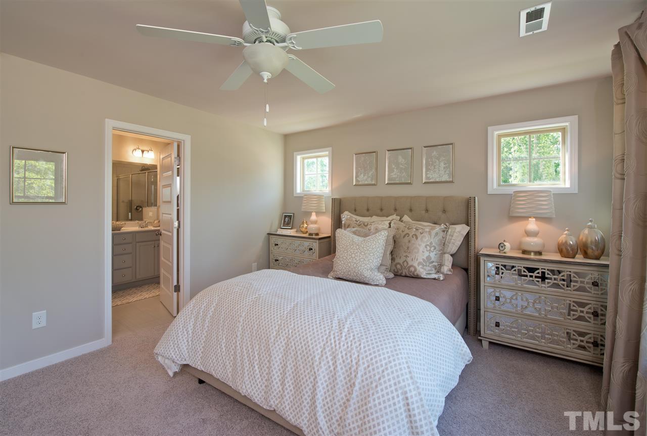 1116 Midtowne Way Durham, NC 27713 - Photo 6 of 25 a bedroom with a bed and a window