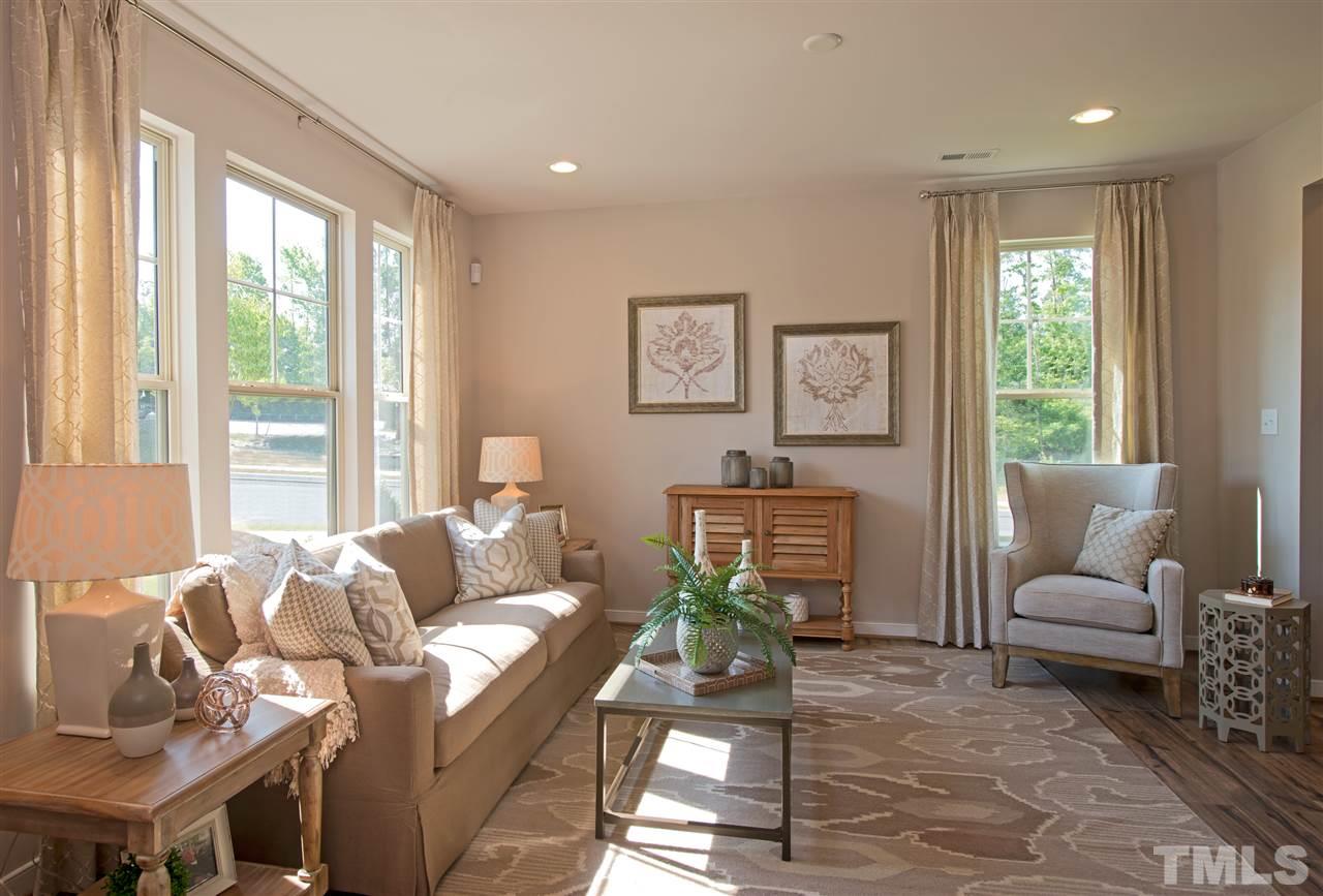 1116 Midtowne Way Durham, NC 27713 - Photo 9 of 25 a living room with furniture and a large window